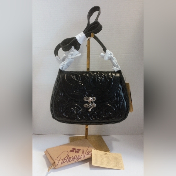 Patricia Nash Handbags - SOLD NWT Patricia Nash Black Rose Tooled Leather Lucia Crossbody Purse